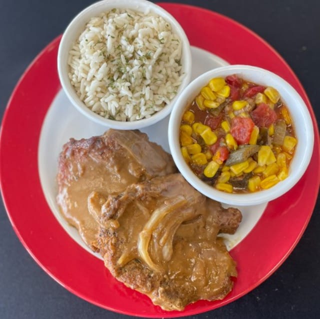 (2) Smothered Pork Chops.